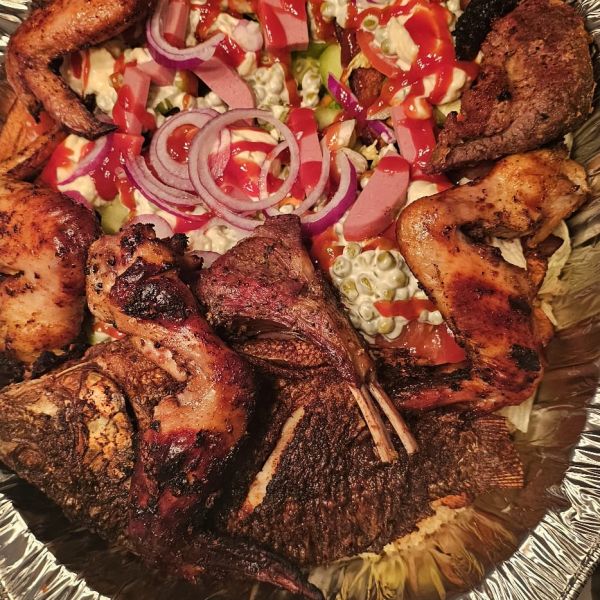 Salone Acheke with fish, chicken, and meat